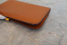 画像をギャラリービューアに読み込む, HERMES/エルメス ドゴンGM トゴ ゴールド/ソレイユ □M刻印 財布 800010095